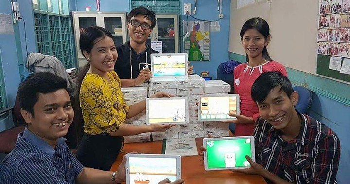 Cufa's Myanmar team unpack the phablets for the CFL app